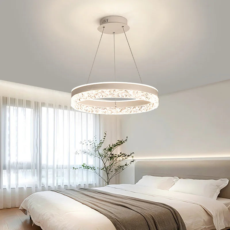 Modern LED chandelier in bright bedroom with natural daylight